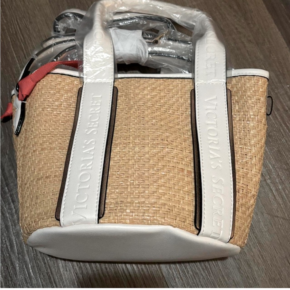 Victoria’s Secret Tan and cream woven crossbody bag with a boho touch